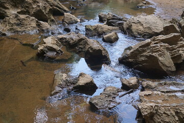 The rocks in the mineral water flow naturally