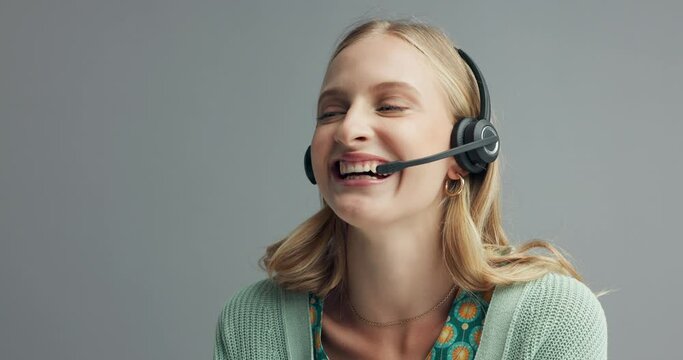 Call center, customer support and happy woman in studio consulting for b2b, crm or loan help on grey background. Telemarketing, online shopping and female consultant with friendly virtual assistance