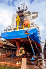 Ship in a ship repair drydock in the Port of Rotterdam. - 736074455