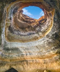 Papier Peint photo Plage de Marinha, Algarve, Portugal Inside the stunning Benagil Cave with its famous "eye", (Algar de Benagil), Lagoa, Algarve, Portugal