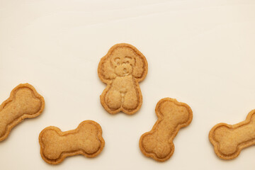 poodle cookies and bone biscuits on the table. Copy space