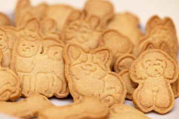 Cookies in the form of dogs in close-up on a plate