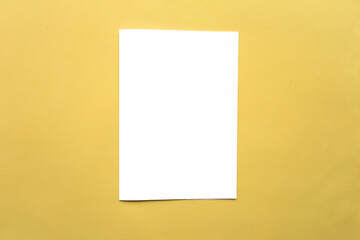 White mockup blank on yellow background