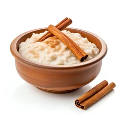 Fototapeten a Arroz con leche rice pudding with cinnamon in bowl © singgih