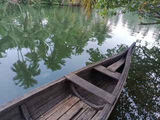 A wooden vehicle used for water transport is usually called a canoe.
