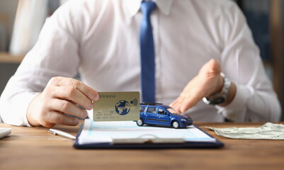 Agent offers to buy car credit card and clearance. Purchase and registration vehicle. Execution...