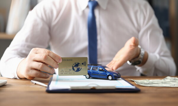 Agent offers to buy car credit card and clearance. Purchase and registration vehicle. Execution documents confirming ownership rights. Acceptance transfer deed supported by dealers signature