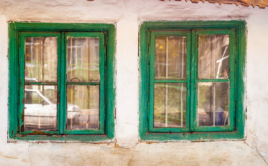 Fototapeta na wymiar Aged Green Window Frames