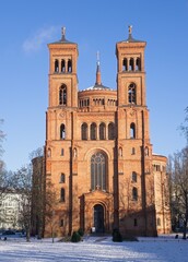 Berlin, Germany - Jan 19, 2024: St. Thomas Church in Berlin. Sunny winter day. Selective focus