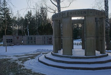 Ludwigsfelde, Germany - Jan 20, 2024: This Red Army war cemetery contains a mass grave with 391 Soviet soldiers who were killed in 1945 during Second World War. Sunny winter day. Selective focus