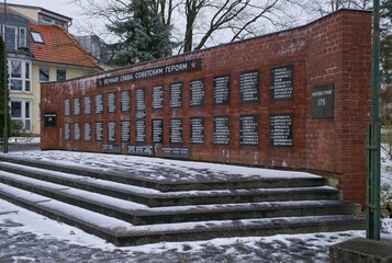 Zeuthen, Germany - Jan 22, 2024: This Red Army war cemetery contains a mass grave with 449 Soviet soldiers who were killed in 1945 during Second World War. Cloudy winter day. Selective focus