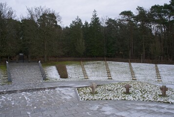 Stahnsdorf, Germany - Jan 22, 2024: This Italian Military Cemetery contains the graves of 1,658 Italian solders who lost their lives during the First World War. Cloudy winter day. Selective focus