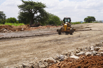 construction machines at works, dozer, roller machine, excavator, crawler rock drill machine,...