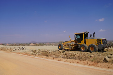 Obraz premium construction machines at works, dozer, roller machine, excavator, crawler rock drill machine, trucks, GPS grader