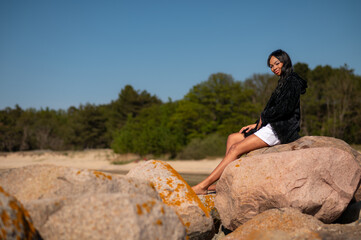 Young beautiful happy latin girl outside