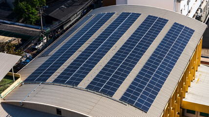 Solar panels installing on building roof for clean energy and sustainability environment 