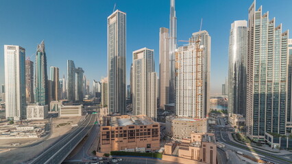 Aerial view of Dubai Downtown skyline with many towers timelapse.