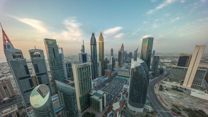 Skyline panorama of the high-rise buildings on Sheikh Zayed Road in Dubai aerial timelapse, UAE.