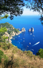 Rocks formations Faraglioni, Island Capri, Gulf of Naples, Italy, Europe.