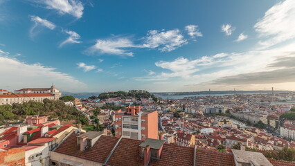Fototapeta na wymiar Panorama showing Lisbon famous aerial view from Miradouro da Senhora do Monte tourist viewpoint timelapse