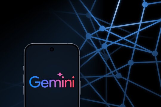 Gemini Logo shown on a modern smartphone in front of connected dots, Gemini is a family of multimodal large language models developed by Google DeepMind, contender to OpenAI's GPT-4, Alphabet, AI