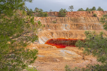 Site view of Sia Mine Red Lake, a former copper and pyrite mine excavation basin filled with water,...