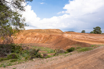 Site view of Sia Mine Red Lake, a former copper and pyrite mine excavation basin filled with water,...