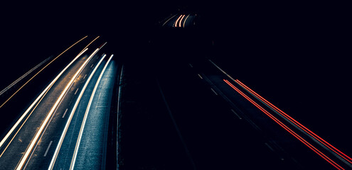 lights of cars driving at night. long exposure