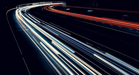 lights of cars driving at night. long exposure