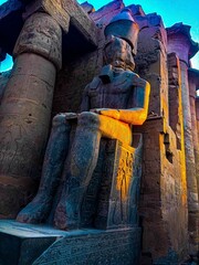 Ancient Statue Ramses II of Luxor temple in Luxor. Egypt
A Majestic Statue in Luxor Temple
 - obrazy, fototapety, plakaty