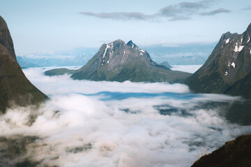 Aerial mountains view above clouds landscape in Norway travel Sunnmore Alps beautiful destinations summer season scandinavian nature morning scenery - 736234814