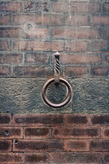 Iron ring on the building's wall in Siena, Italy