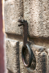 Iron ring on the building's wall in Siena, Italy