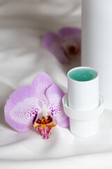 Laundry softener poured into the lid, floral fresh scent