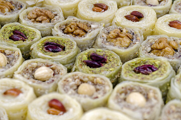 Assorted traditional Turkish dessert, baklava, with various fillings and toppings