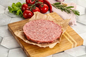 Raw beef uncooked burger cutlet