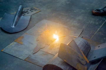 Laser cleaning of metal. The laser beam cleans the metal surface from rust. Laser removes removing...