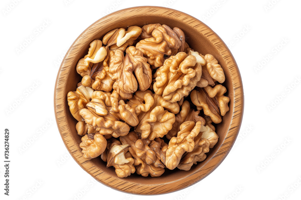 Wall mural Walnuts in a wooden bowl isolated - Wall murals