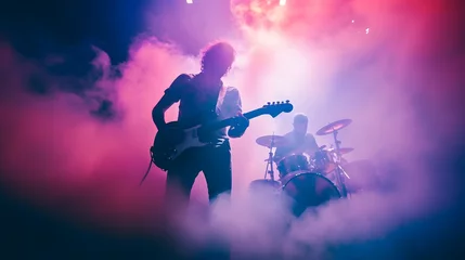 Poster Rock band concert in cloud colorful dust. Music event, Rock band performs on stage colorful dust background. Guitarist, bass guitar and drums on stage. © Ziyan