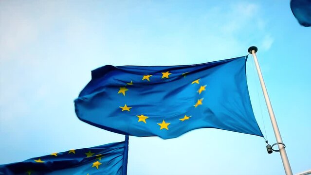 Close up of waving EU flags, slow motion. Brussels, Belgium. 4K