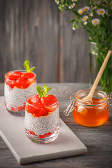 Healthy pudding with chia seeds and strawberries with honey. Healthy eating