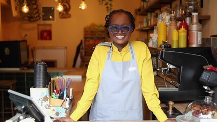 Portrait of a smiling female barista