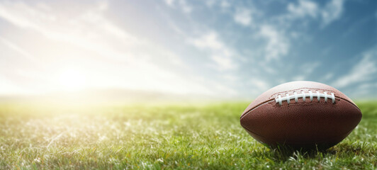 American Football on Sunny Field Background