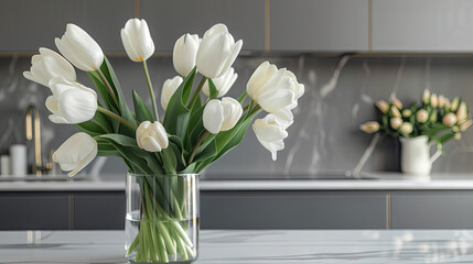 Beautiful spring white tulips on the table in a gray cozy kitchen