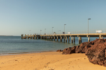 The Cowes jetty, on Phillip Island south of Melbourne, is a popular fishing and tourist spot overlooking the waters of Western Port Bay.