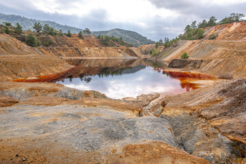 Colorful view of Sia Mine Red Lake, a former copper and pyrite mine excavation basin filled with...