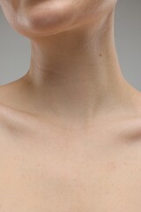 Naklejka premium Beauty concept. Woman on grey background, closeup