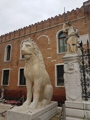 Lion and other sculpture near Arsenale in Venice