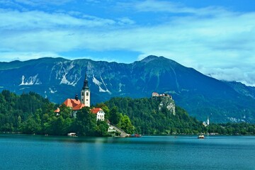 Slovenia - view of the church on the island and the castle on Lake Bled