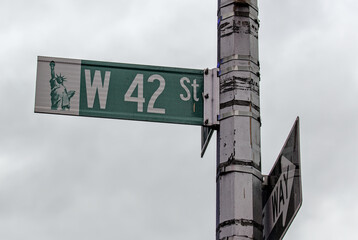 west 42nd street sign on a signpost in midtown manhattan new york city